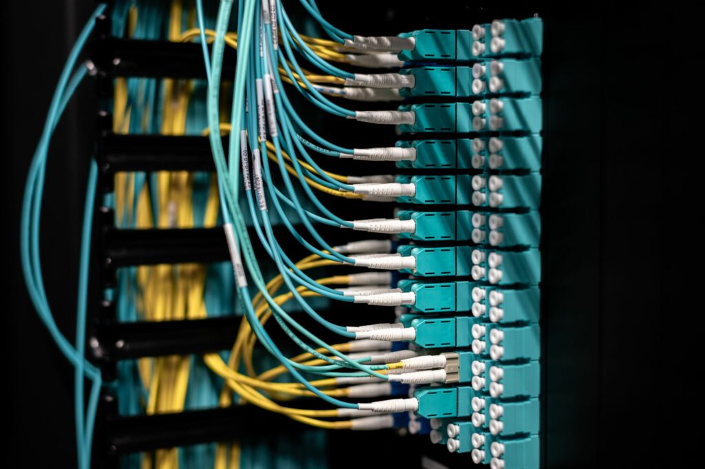 Fan of network cables entering a switch
