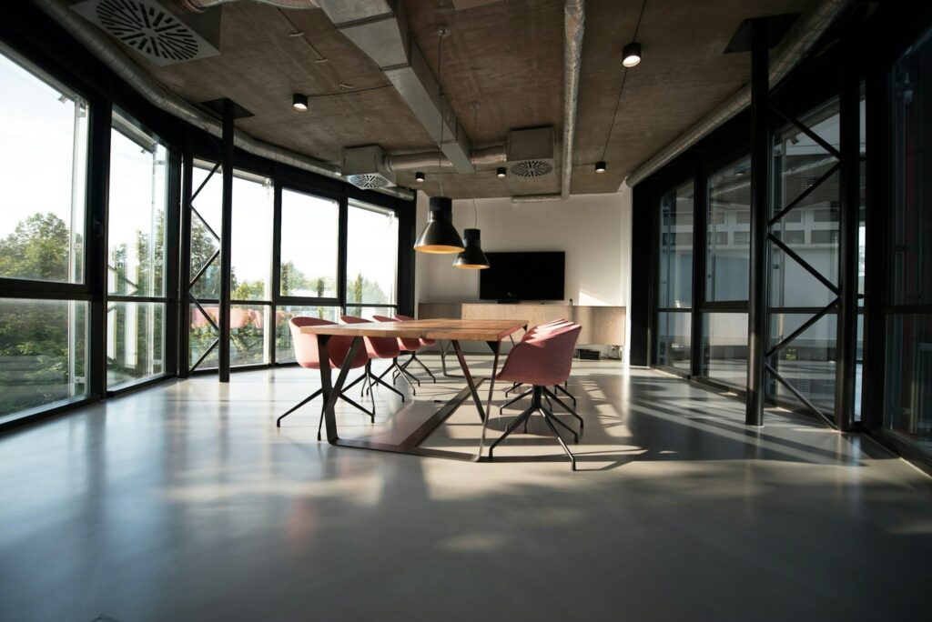 Open-plan office with full-height windows